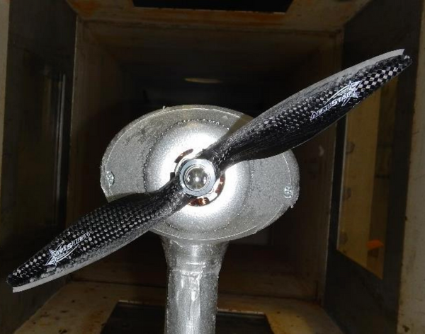 Test stand in wind tunnel with icing on propellers